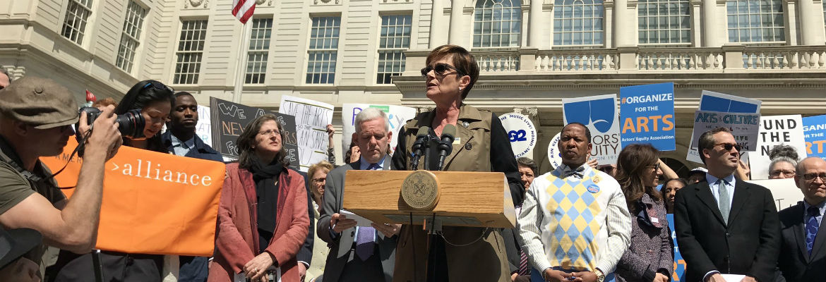 Executive Director Mary McColl addresses the crowd at 2017's Rally to Save the Arts at NY City Hall